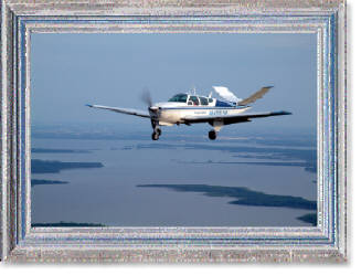 Air to air aerial photography of airplane