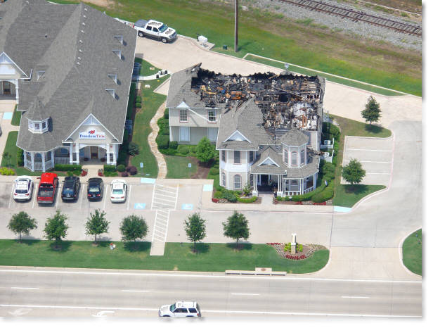 aerial photography of real estate office after a fire